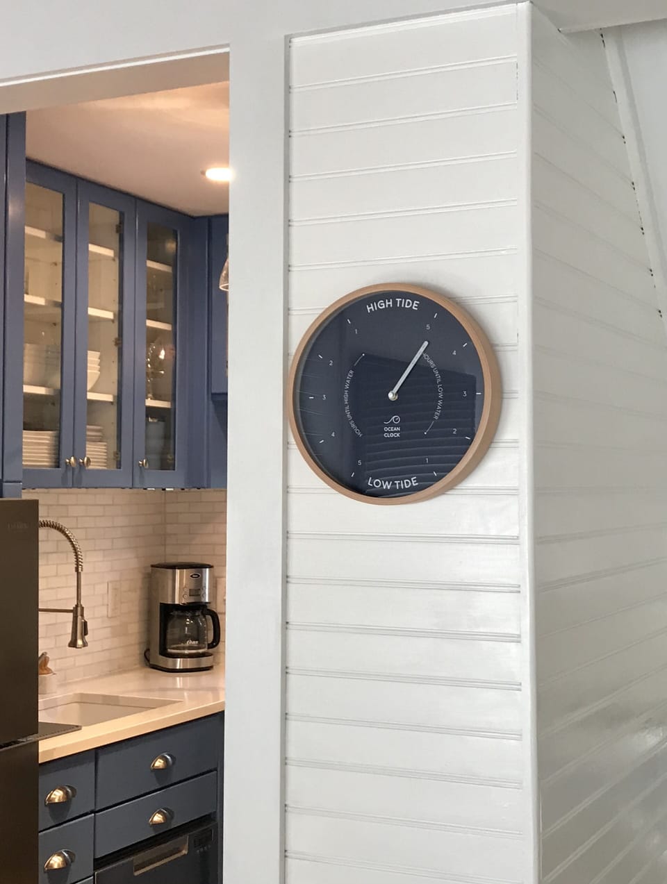 Custom tide clock to let you know when high and low tide will be each day.