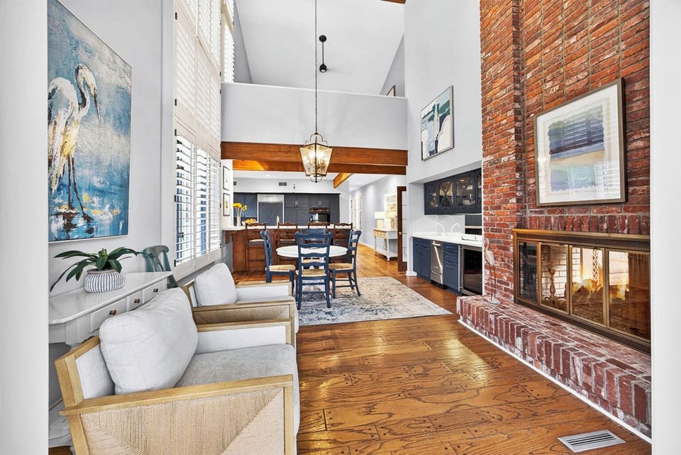 17. open-concept coastal living from the sunroom to the kitchen