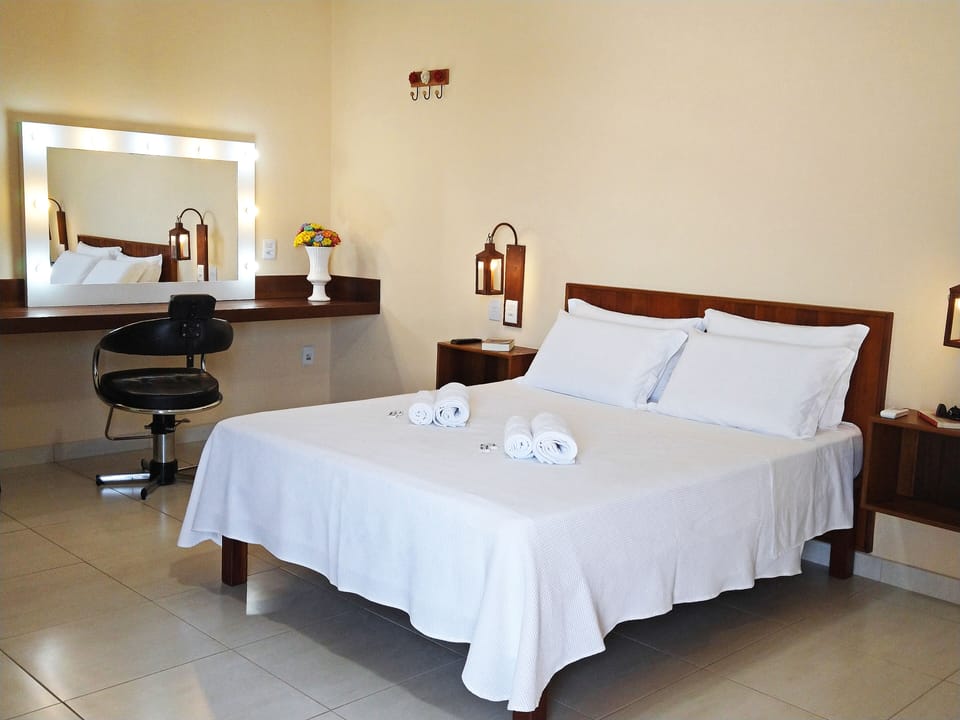 Deluxe Double Room, 1 Queen Bed | Minibar, individually furnished, desk, laptop workspace