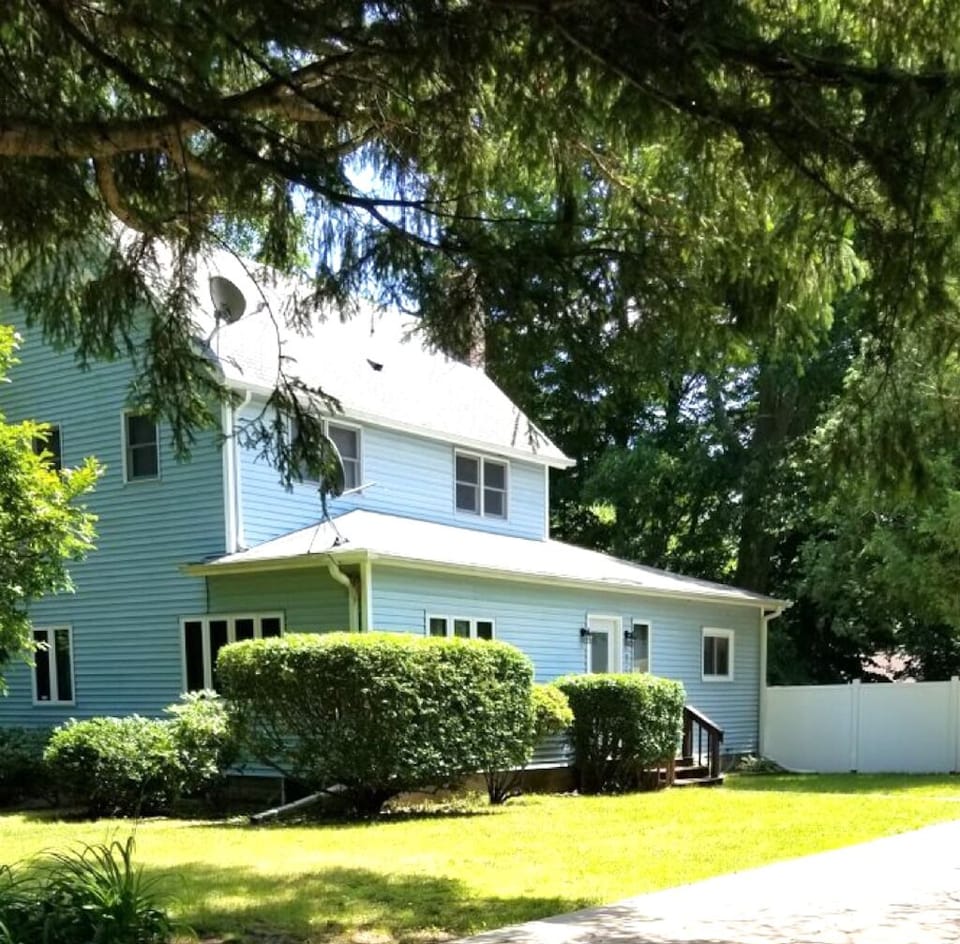 Front of House with Paved Driveway Parking