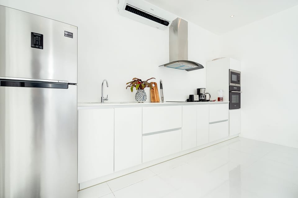 Deluxe Villa, 3 Bedrooms | Private kitchen | Fridge, microwave, electric kettle, highchair