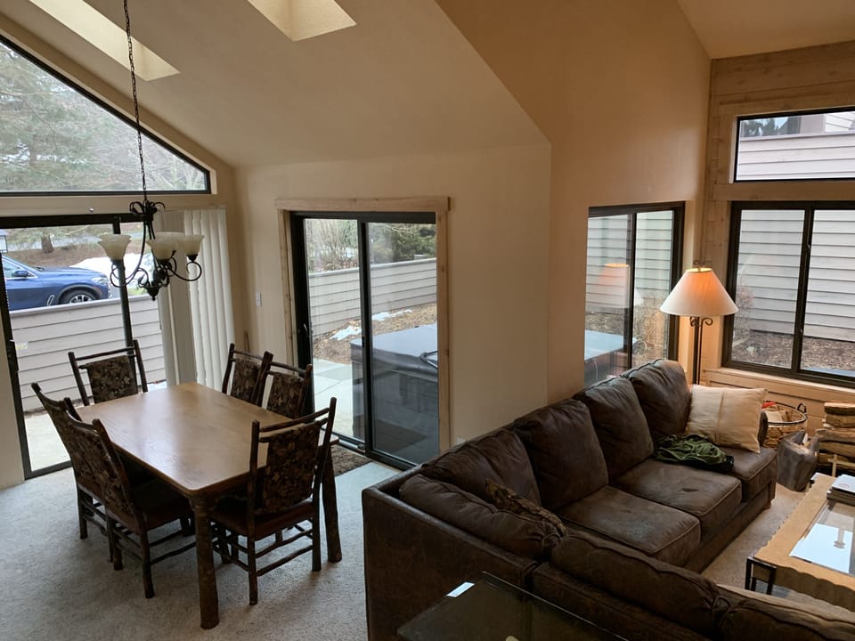 Living room opens to the deck, dining room, and kitchen. Great for large groups.
