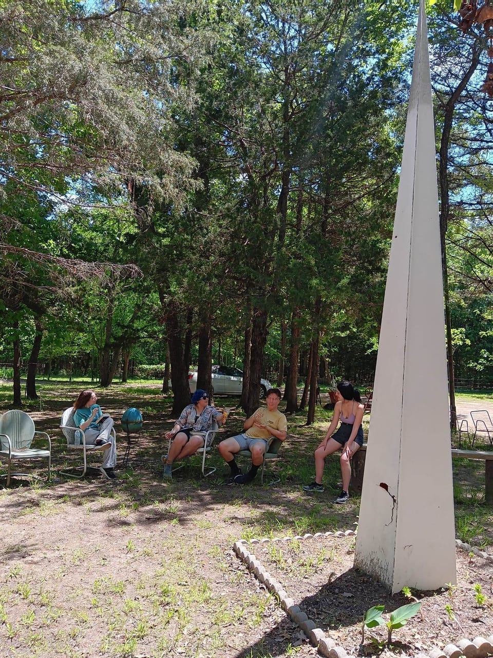 Friends chilling by the church steeple