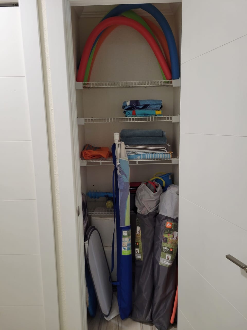 Beach chairs, umbrella, towels, cooler and few other things. 