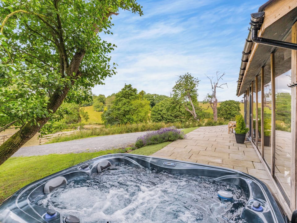 Hot tub | The Hideaway - Unique Welsh Stays, Aberhafesp, near Newtown
