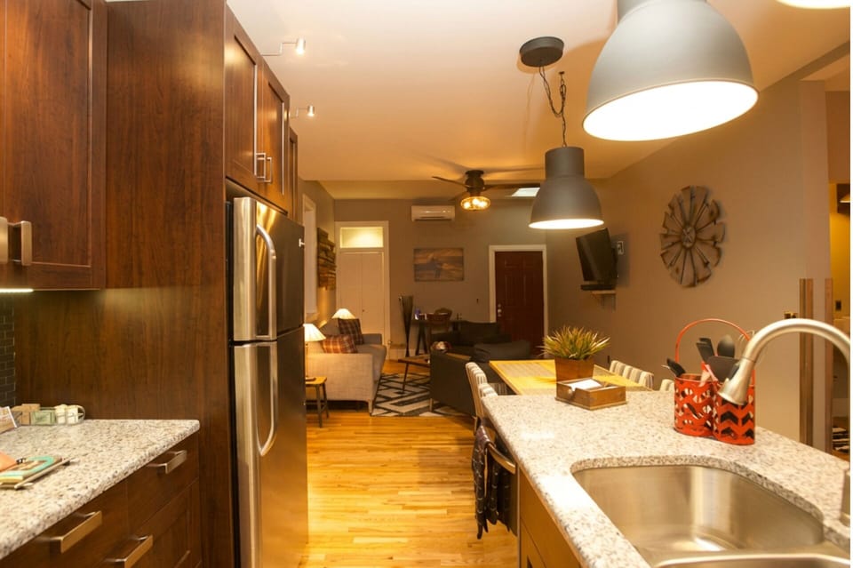 The dishwasher is very quiet (about 50 db) - it is just to the left of the kitchen's double sink and across from the refrigerator with ice maker.
