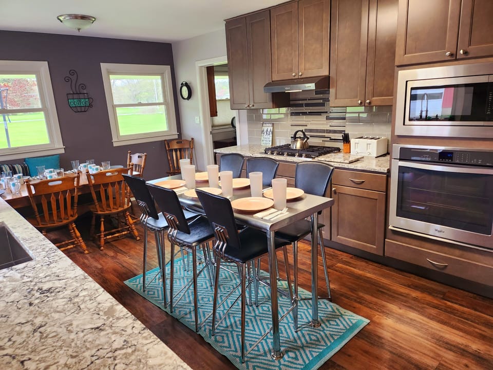 Updated kitchen with quartz countertops. 