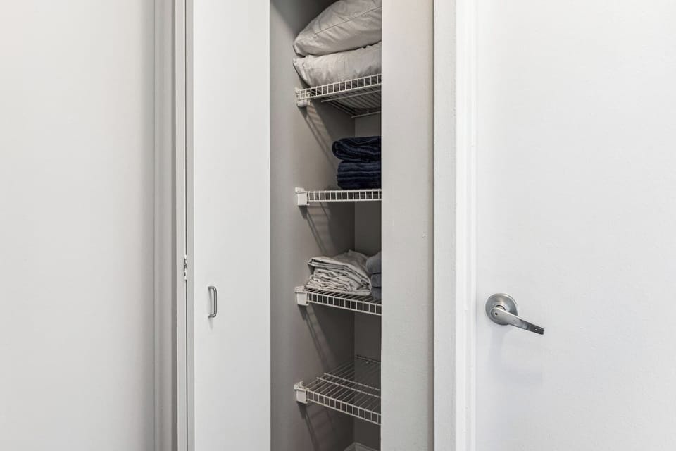 Storage closet for extra sheets, blankets and towels.