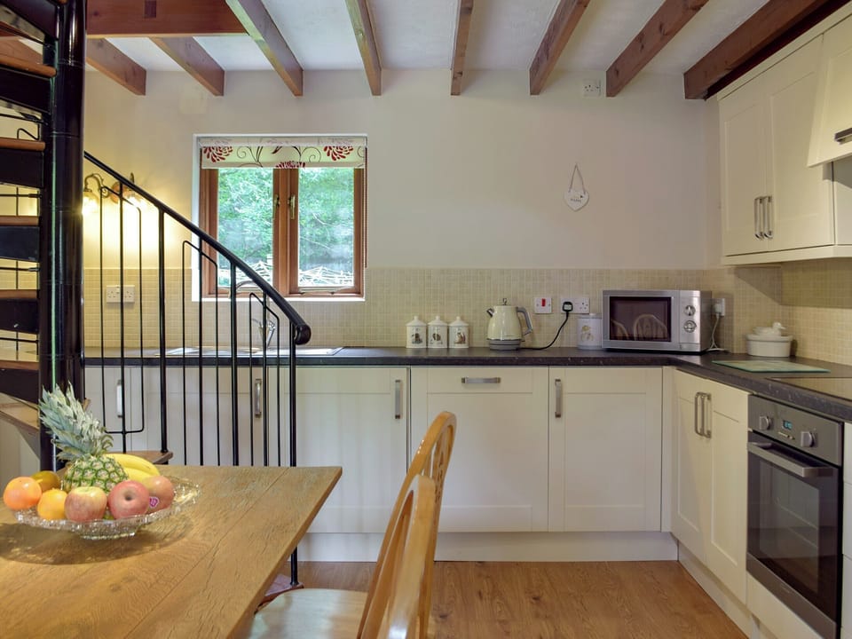 Kitchen/diner | Keepers Nook - Dinas Country Club, Dinas Cross, near Newport