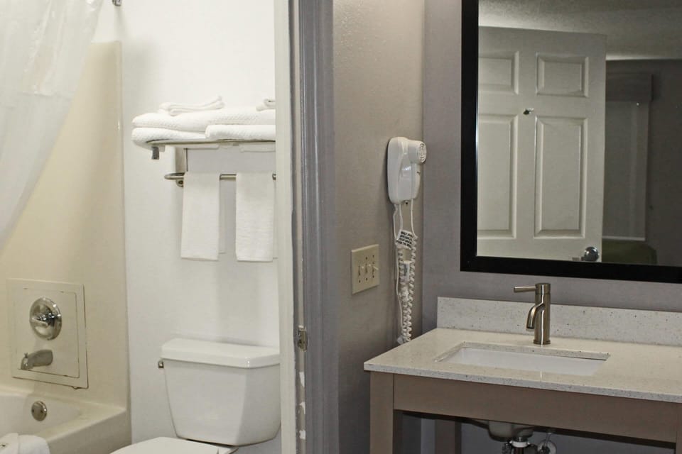 Blackout drapes, iron/ironing board, free WiFi, bed sheets