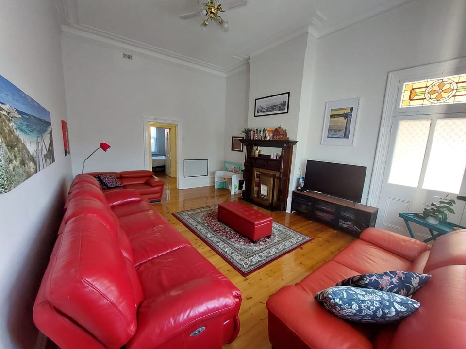 Comfortable light filled Living Room.  Plenty of toys to keep children busy