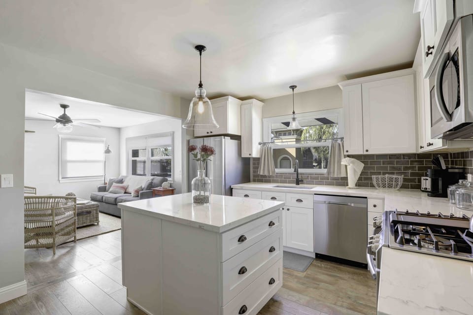 Kitchen has a full size refrigerator, dishwasher, stove/oven and microwave. There is a counter-height dining table with stools that nicely store under the table.