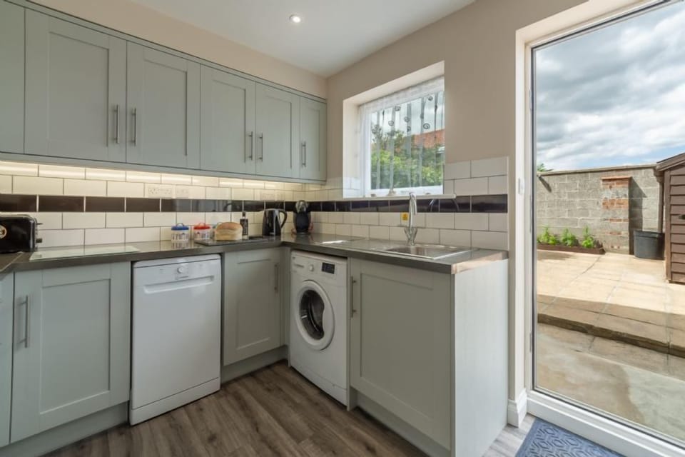 Ground Floor: Kitchen with door to courtyard garden