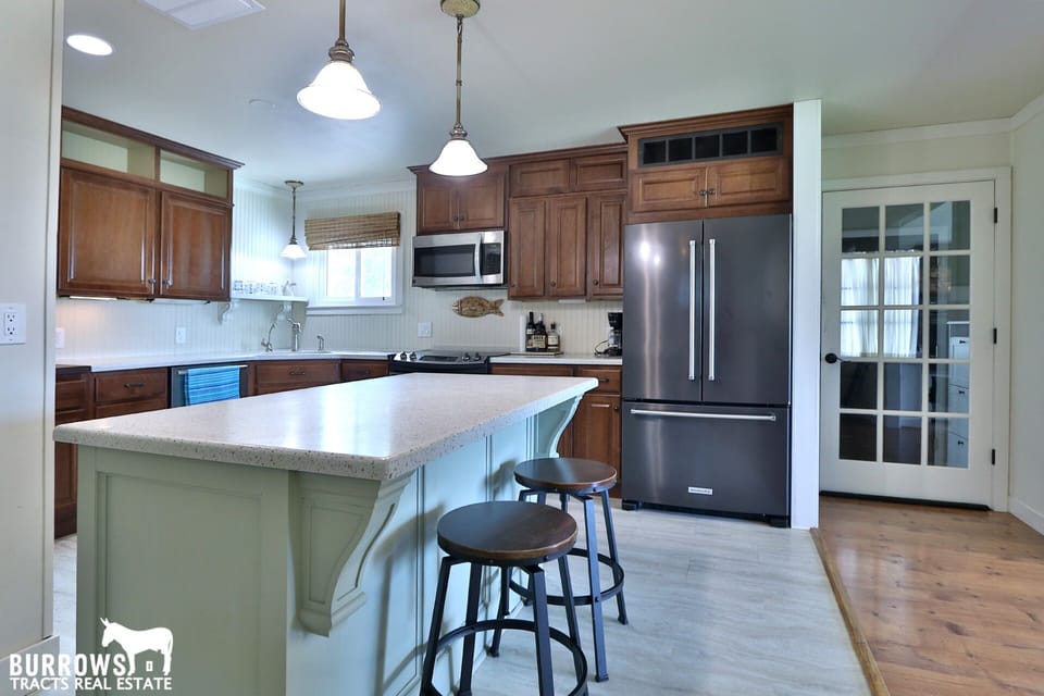 Kitchen with island and updated appliances