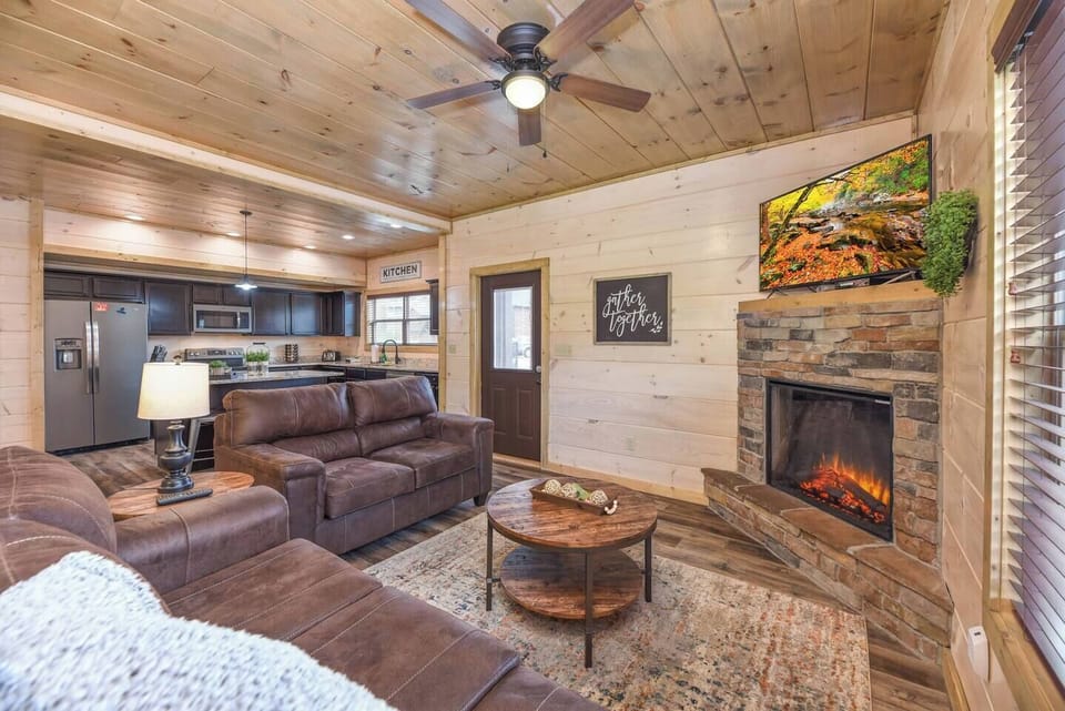 The heart of the home awaits in the Great Room, where a warm fireplace invites you to unwind and create lasting memories. 55" HDTV, Smart TV's throughout the home