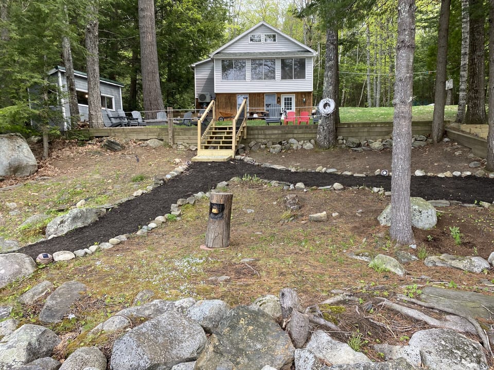 Steps and path leading from the house to the lake. 
