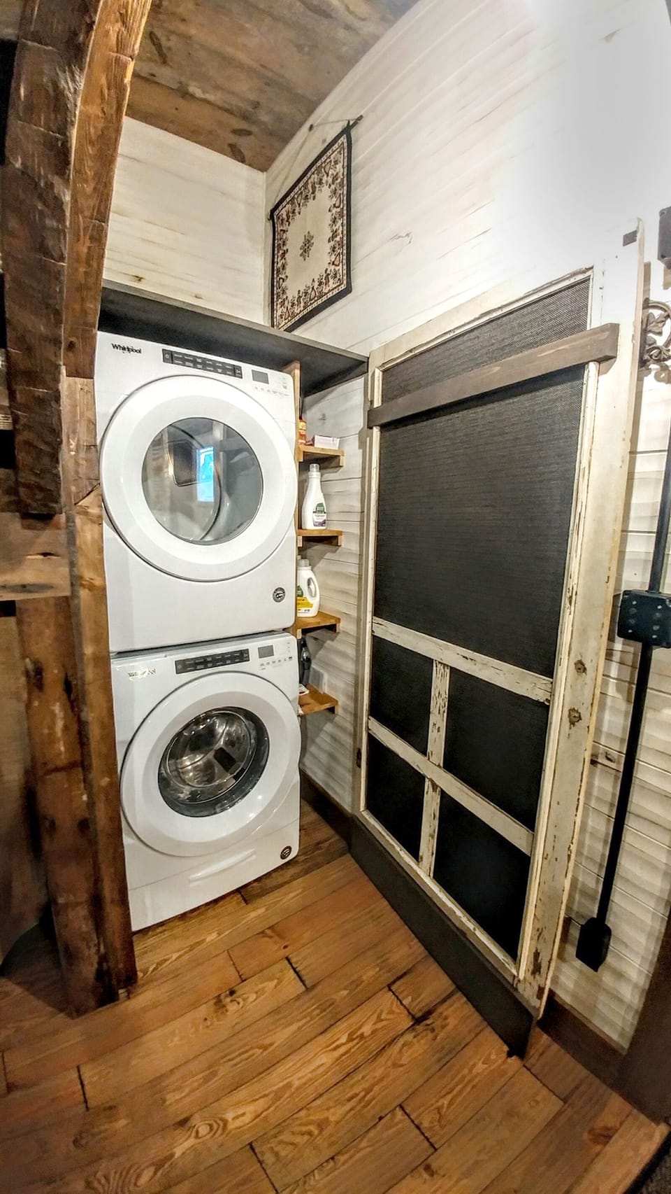Washer and dryer are include laundry detergent and cleaners with a laundry sink on the lower left