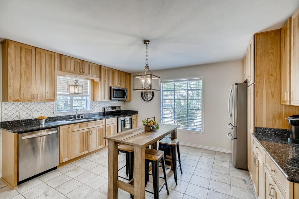 Kitchen with extra bar top for meals 