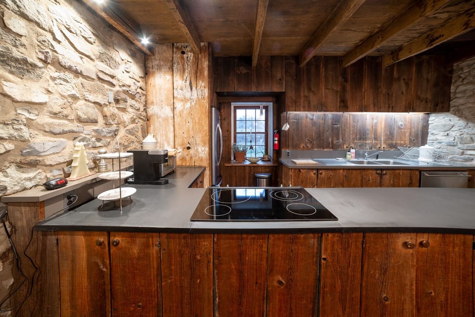The kitchen with barn wood cabinets