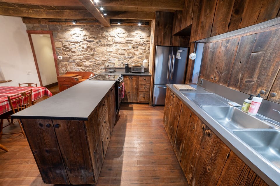 The kitchen with barn wood cabinets