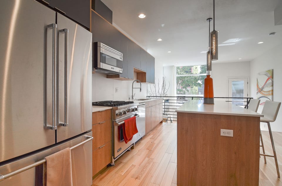 Kitchen area with stainless steel appliance