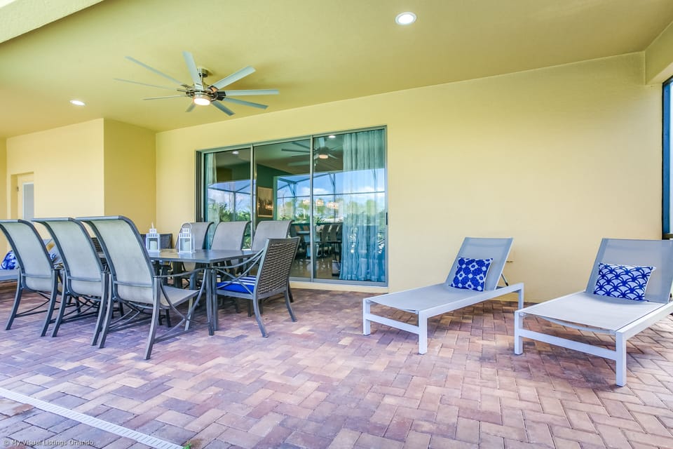View 5 of grand patio with tables and loungers - View 5 of grand patio with tables and loungers
