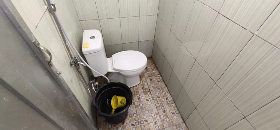 Shower, slippers, bidet, towels