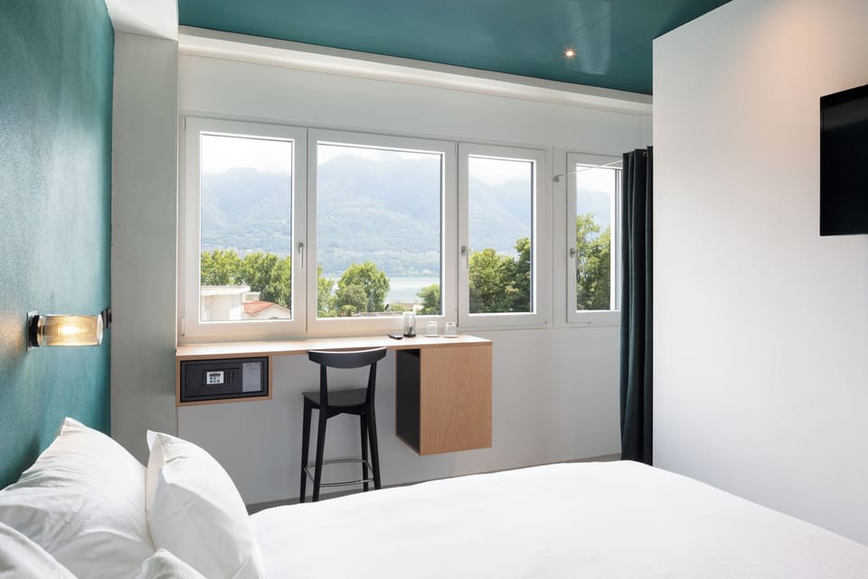 Down comforters, pillowtop beds, free minibar, in-room safe