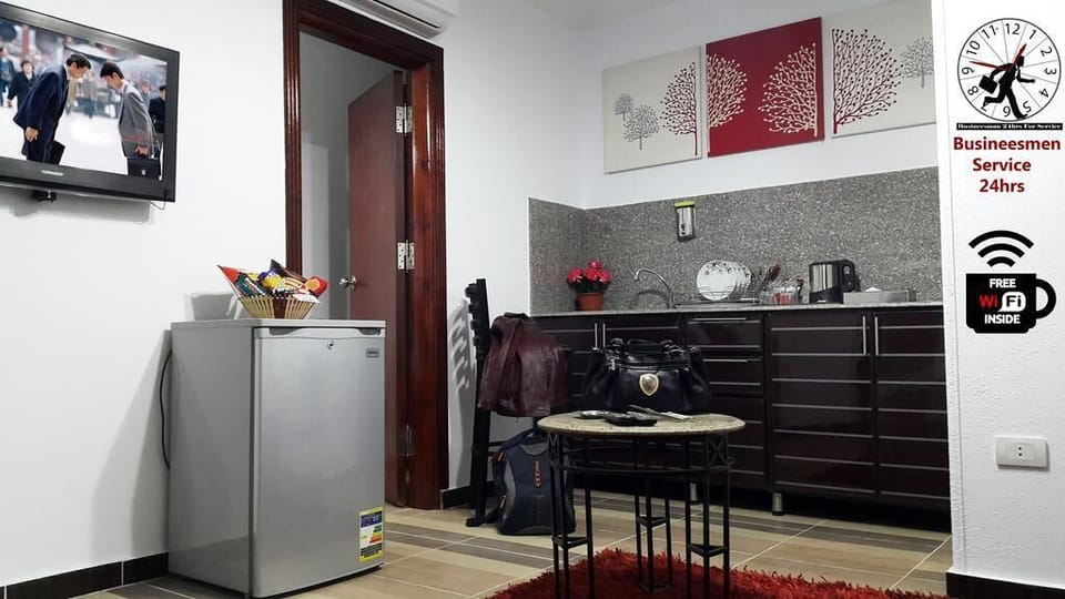 Mini-fridge, microwave, coffee/tea maker, coffee grinder