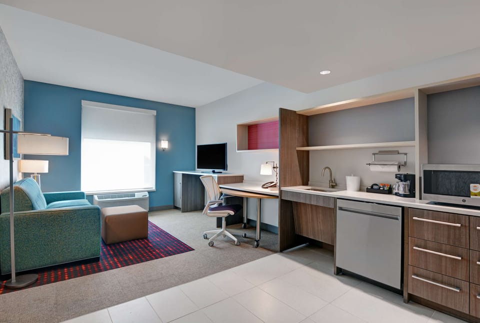 Suite, 1 Bedroom, Non Smoking | Private kitchen | Coffee/tea maker, full-size fridge, microwave, dishwasher