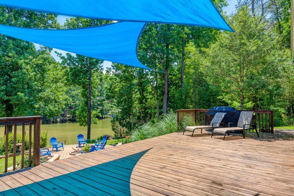 The deck provides a spacious area for lounging and enjoying the outdoors.