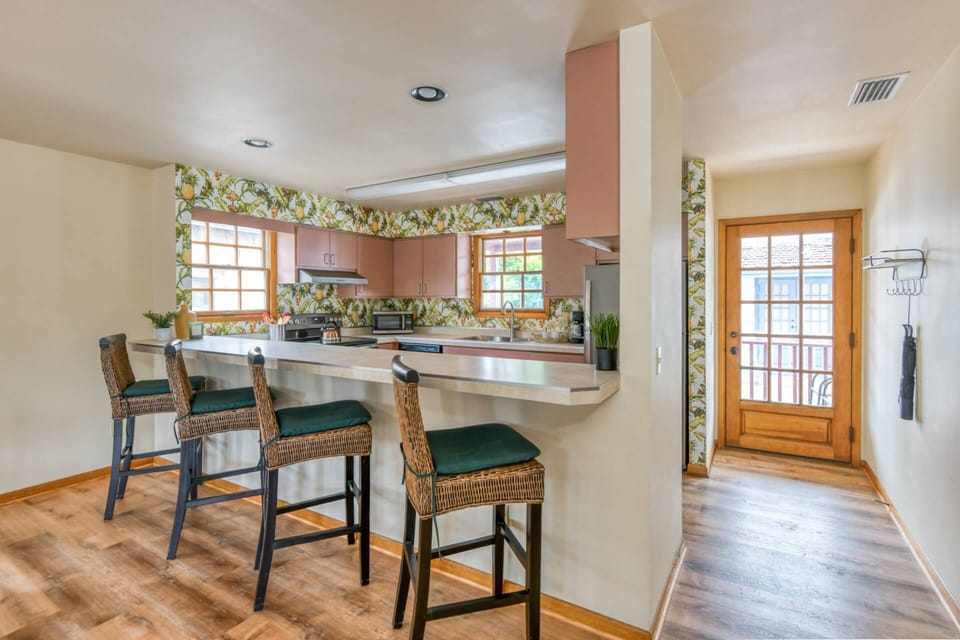 This oversized kitchen and bar are perfect for entertaining.