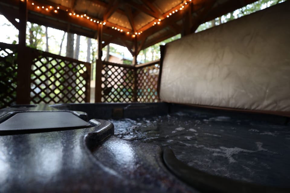 Full privacy fence with latching gate & hot tub steps. Hot tub not shared.