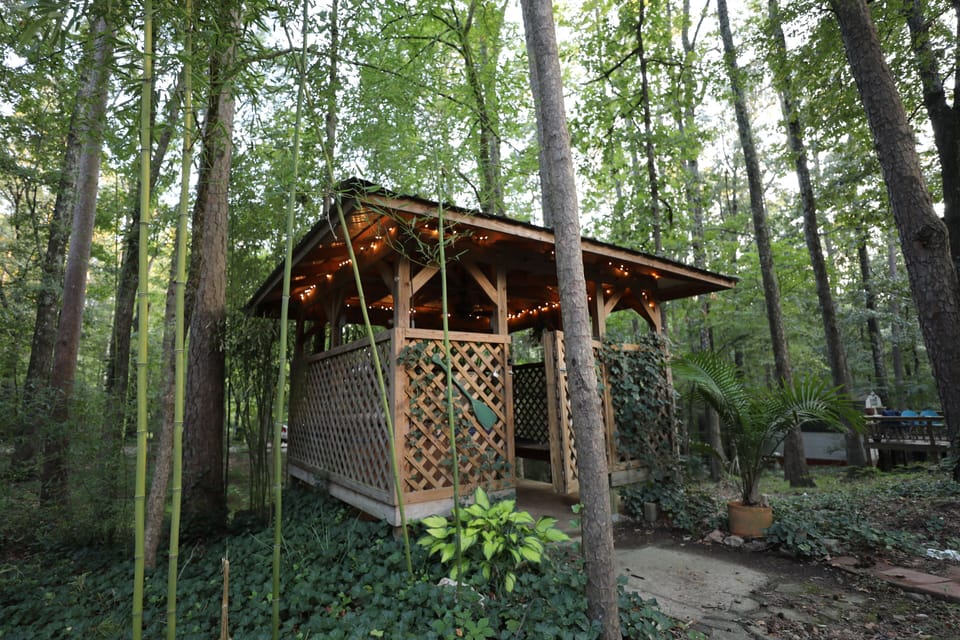 Hot tub seats 4 adults w/ a full privacy fence & is solely for staying guests.