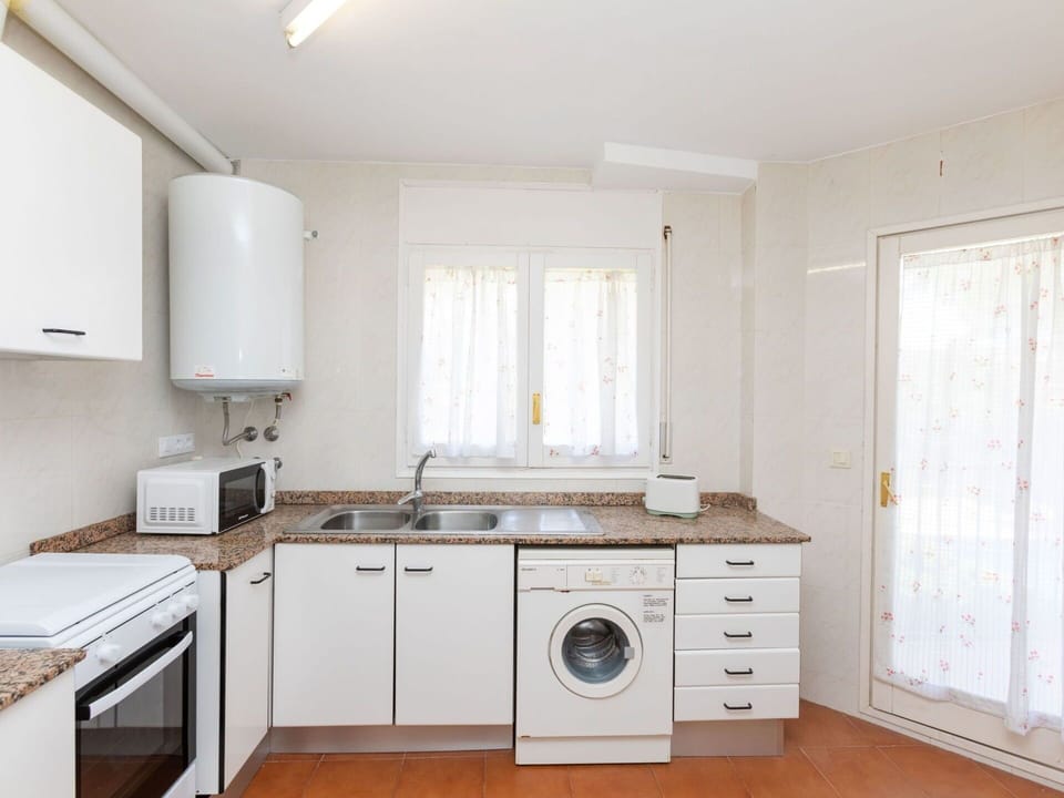 Cabinetry, Property, Countertop, Building, Window, Sink, Wood, Kitchen, Kitchen Stove, Flooring