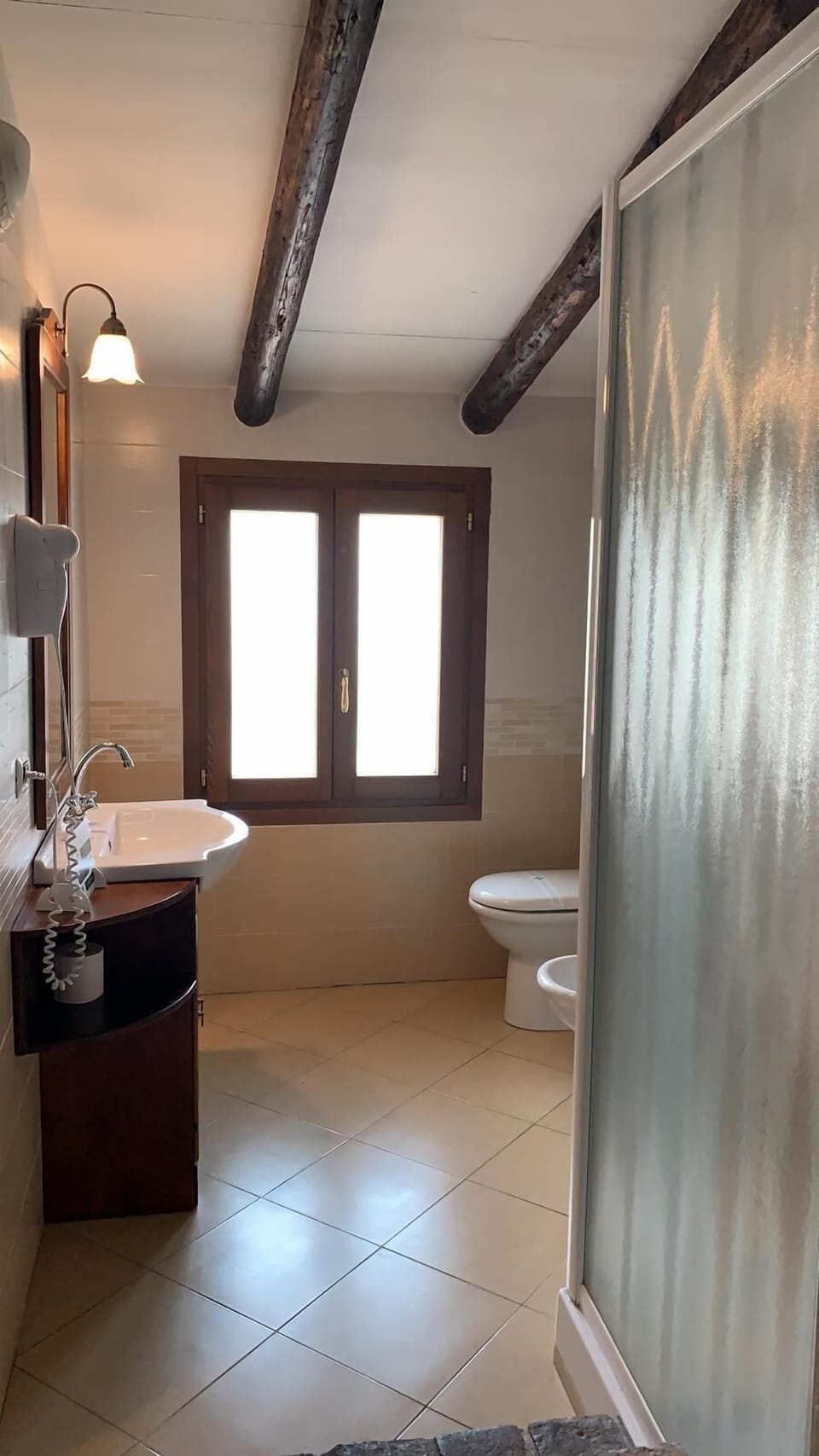 Double Room | Bathroom | Shower, hair dryer, bidet, towels
