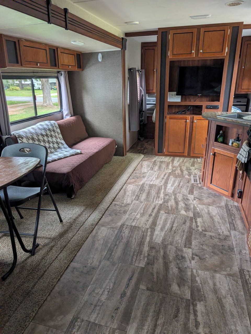 interior, indoor, television, kitchen visible