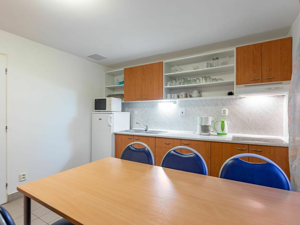 Cabinetry, Tap, Building, Kitchen Sink, Countertop, Table, Furniture, Property, Sink, Kitchen Appliance