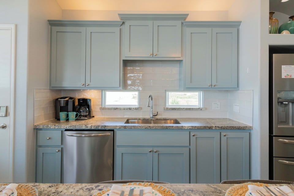Cleanup is a breeze with the oversized stainless steel sink, ready for sandy cups and seafood dinners alike.