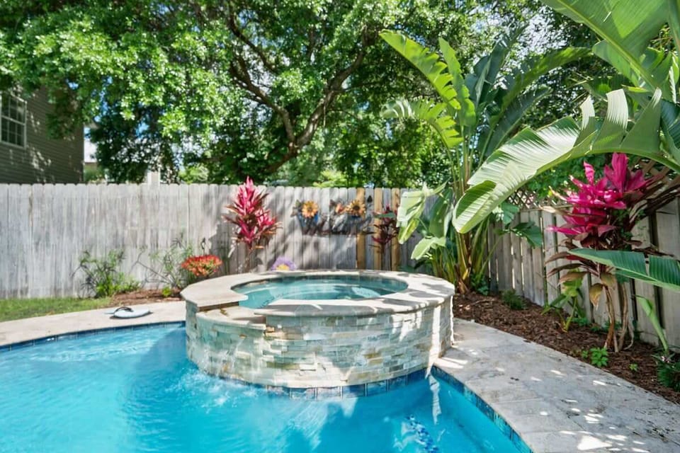 Enjoy this gorgeous private oasis! Lounge chairs and umbrella provided. Non-heated pool. Jacuzzi IS heated!