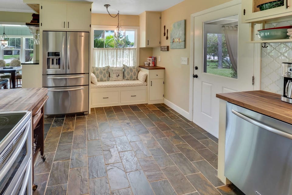 Cozy window seat and door to side screened porch