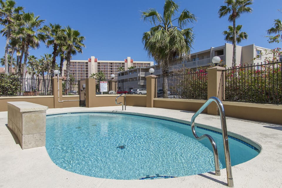 Sparkling shared pool perfect for cooling off after a beach day