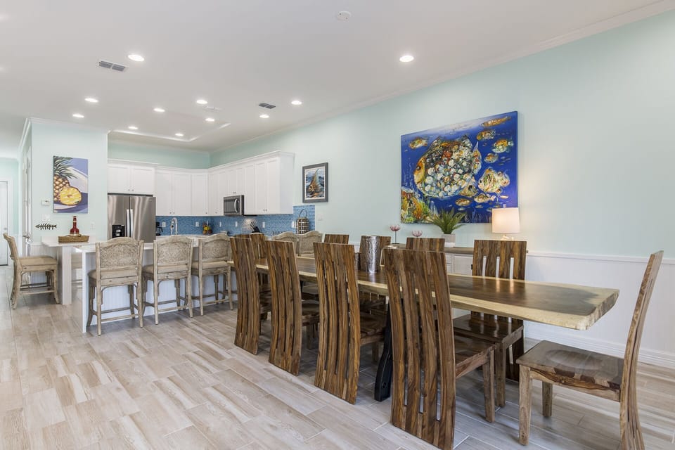Spacious dining area with additional seating at the oversized kitchen island.