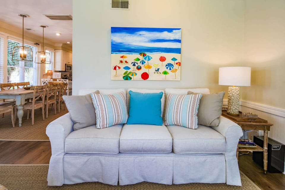The living room opens into the dining area and kitchen.