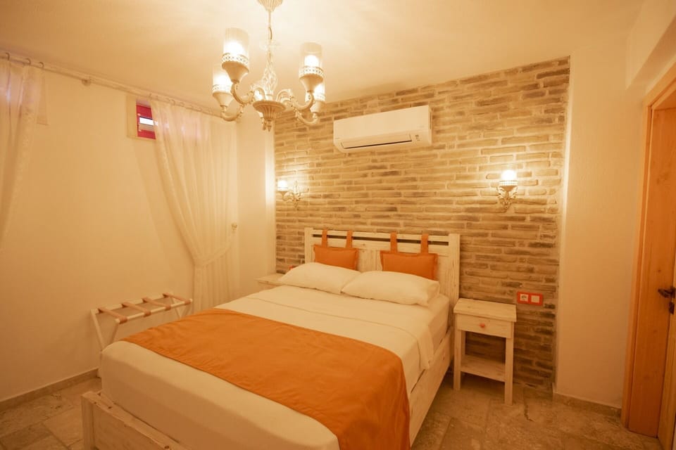 Economy Double Room | Minibar, laptop workspace, WiFi (free), individually decorated