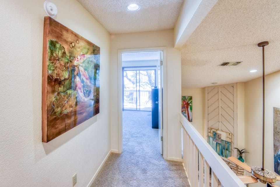 Walkway to 3rd bedroom with pond theme