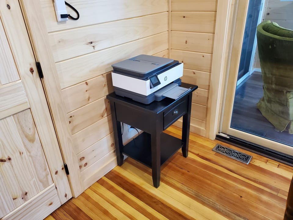 There is a network / WIFI printer for your use as your work gets done.