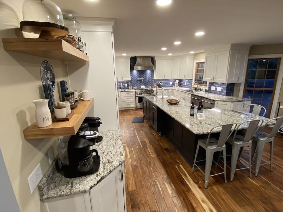 2 stoves, 6 burner cooktop, 2 dishwashers, coffee bar, and built in ice maker