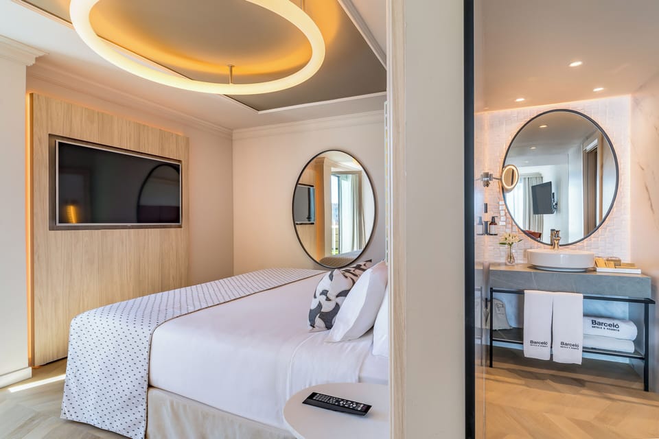 Junior Suite, Balcony (Outdoors Table) | Minibar, in-room safe, desk, laptop workspace