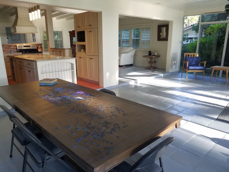 Living Room overlooking Pool and Lake